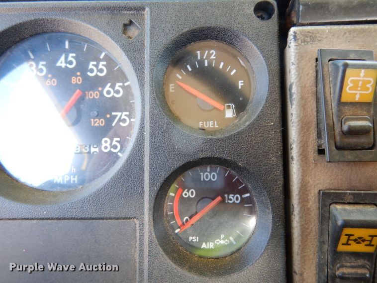 image for item DJ6740 1999 Freightliner FL112  flatbed truck