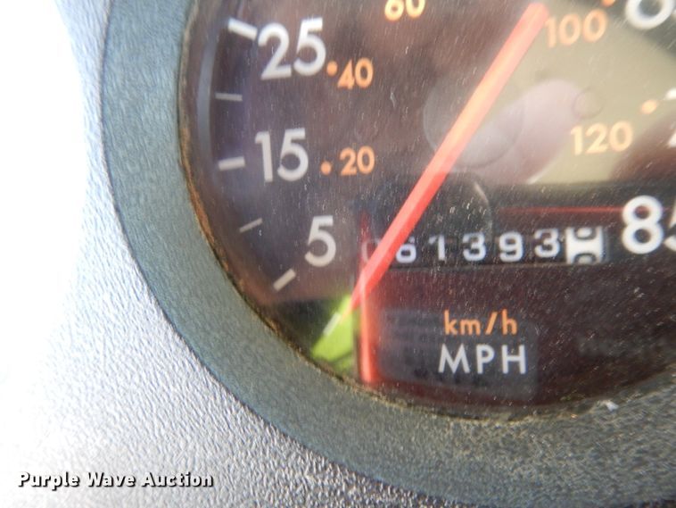 image for item DJ6740 1999 Freightliner FL112  flatbed truck