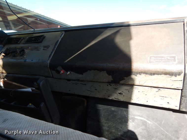 image for item DJ6740 1999 Freightliner FL112  flatbed truck