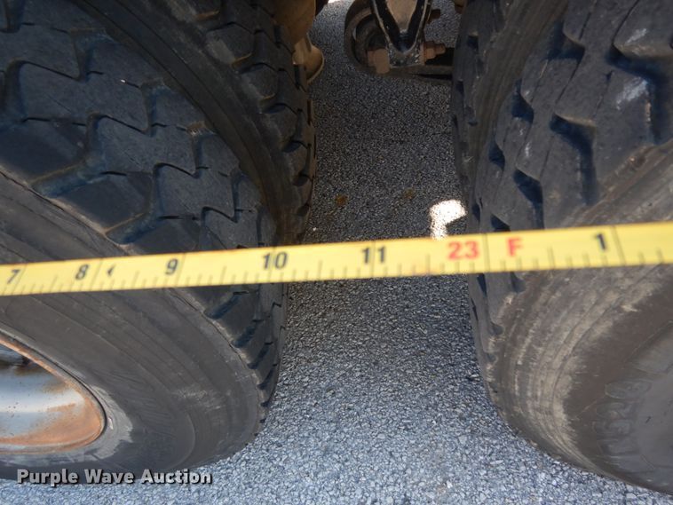 image for item DJ6740 1999 Freightliner FL112  flatbed truck