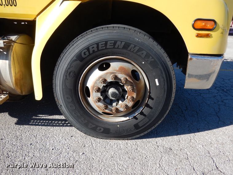 image for item DJ6740 1999 Freightliner FL112  flatbed truck