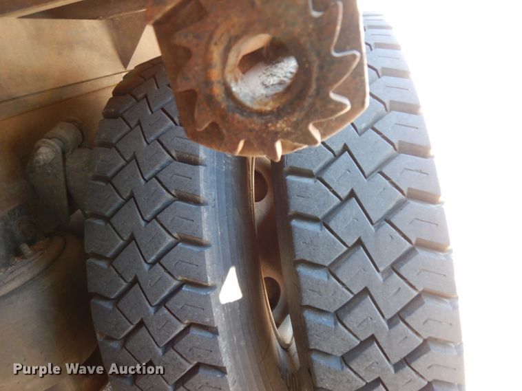 image for item DJ6740 1999 Freightliner FL112  flatbed truck