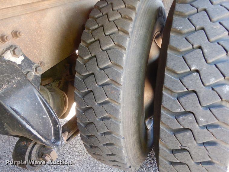 image for item DJ6740 1999 Freightliner FL112  flatbed truck