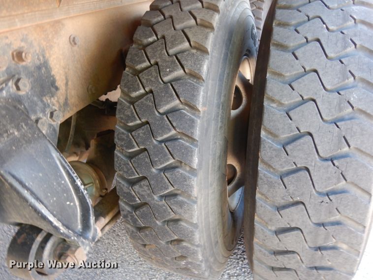 image for item DJ6740 1999 Freightliner FL112  flatbed truck