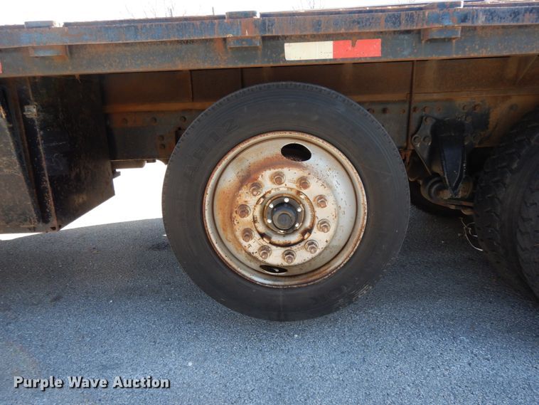 image for item DJ6740 1999 Freightliner FL112  flatbed truck