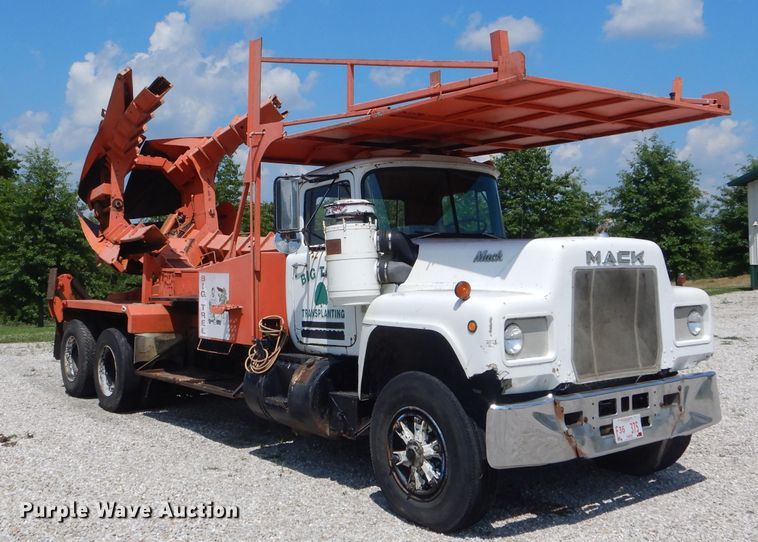 image for item HM9676 1979 Mack R686ST  flatbed truck with Big John tree transplanter