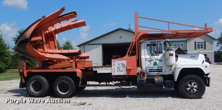 image for item HM9676 1979 Mack R686ST  flatbed truck with Big John tree transplanter