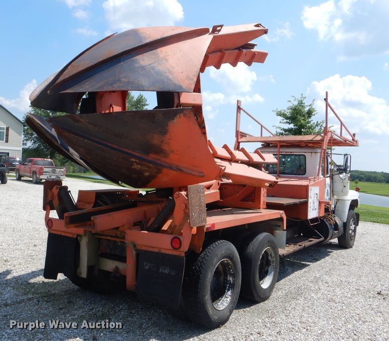 image for item HM9676 1979 Mack R686ST  flatbed truck with Big John tree transplanter