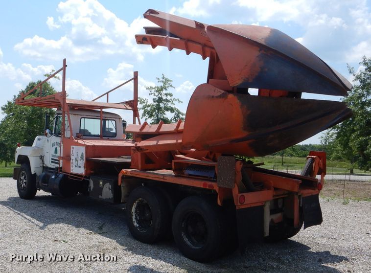 image for item HM9676 1979 Mack R686ST  flatbed truck with Big John tree transplanter