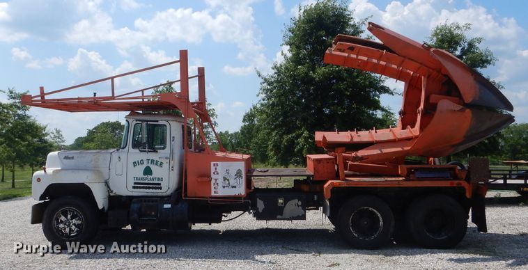 image for item HM9676 1979 Mack R686ST  flatbed truck with Big John tree transplanter