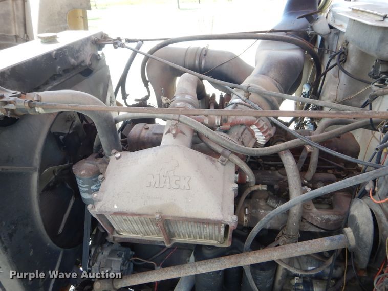 image for item HM9676 1979 Mack R686ST  flatbed truck with Big John tree transplanter