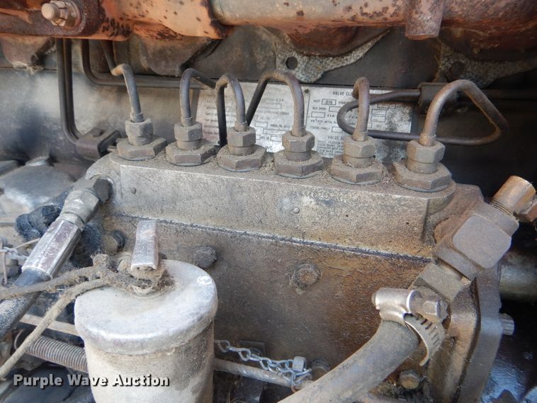 image for item HM9676 1979 Mack R686ST  flatbed truck with Big John tree transplanter