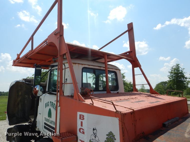 image for item HM9676 1979 Mack R686ST  flatbed truck with Big John tree transplanter