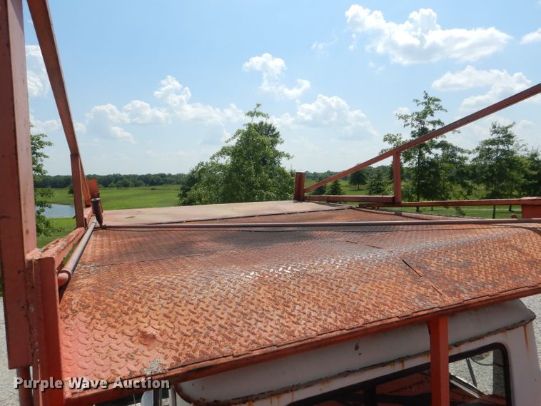 image for item HM9676 1979 Mack R686ST  flatbed truck with Big John tree transplanter