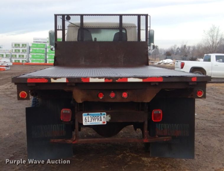 image for item HU9813 2000 International 4700  dump flatbed truck