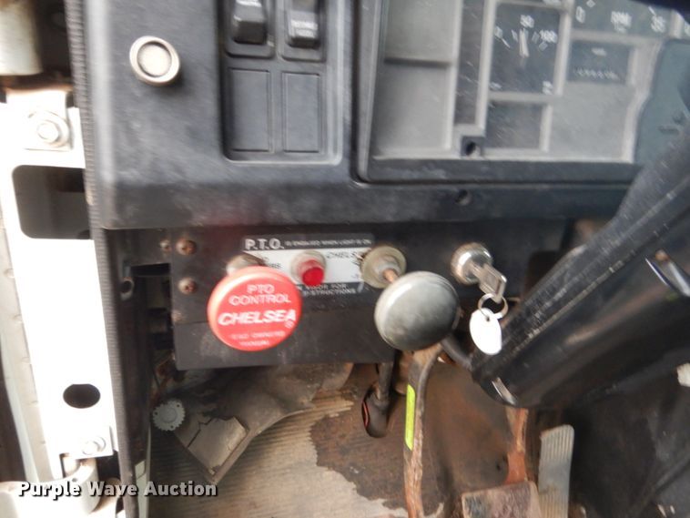 image for item HU9813 2000 International 4700  dump flatbed truck