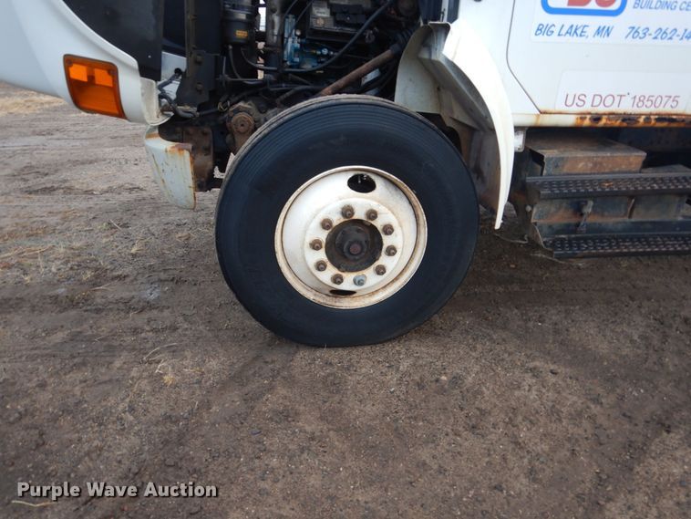 image for item HU9813 2000 International 4700  dump flatbed truck