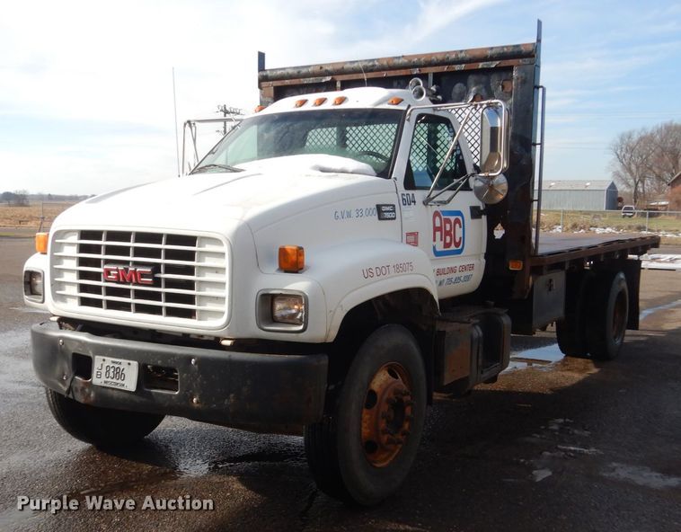 image for item HU9815 2002 GMC C7500  dump flatbed truck