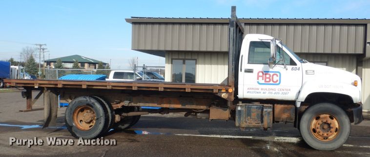image for item HU9815 2002 GMC C7500  dump flatbed truck