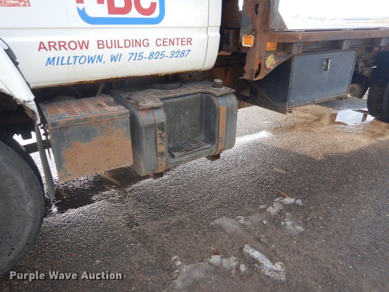 image for item HU9815 2002 GMC C7500  dump flatbed truck