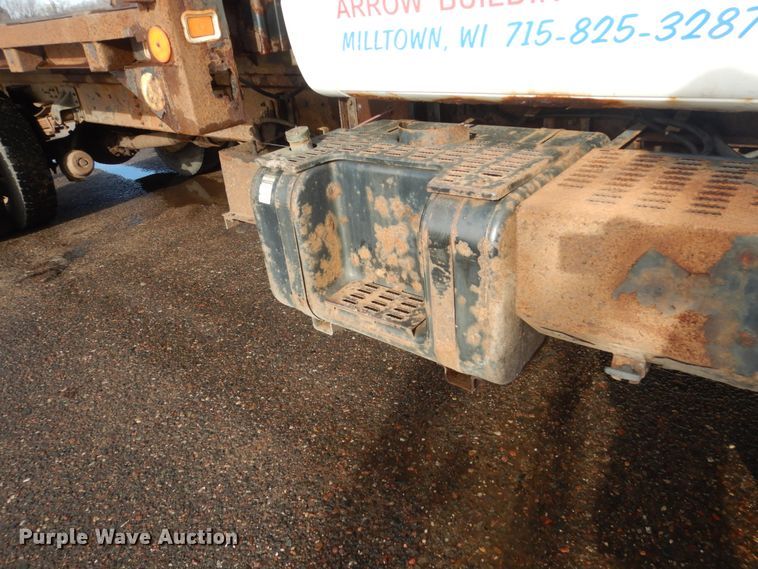 image for item HU9815 2002 GMC C7500  dump flatbed truck