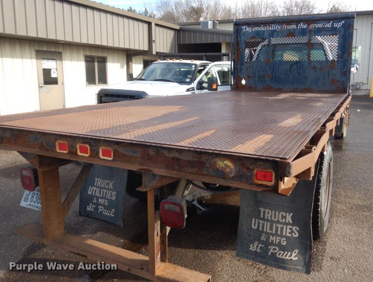 image for item HU9815 2002 GMC C7500  dump flatbed truck