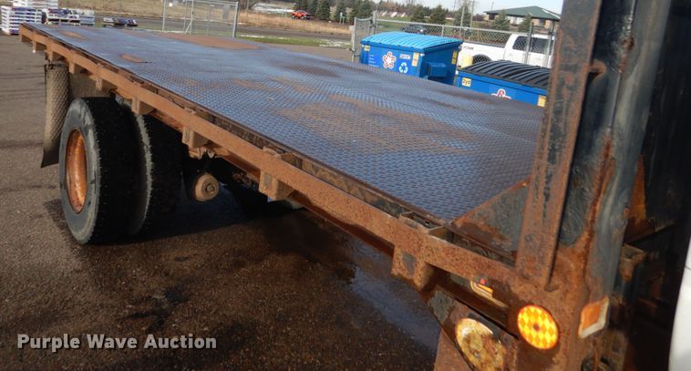 image for item HU9815 2002 GMC C7500  dump flatbed truck