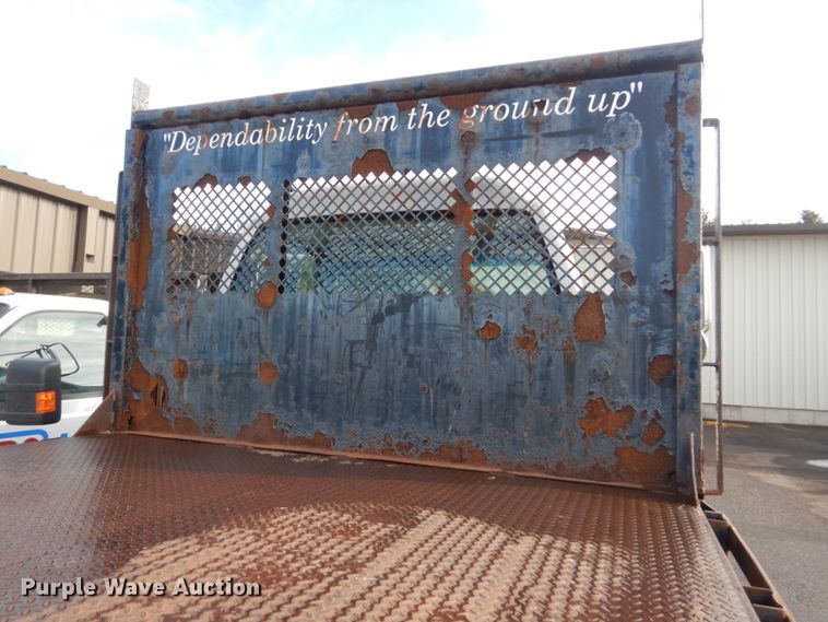 image for item HU9815 2002 GMC C7500  dump flatbed truck