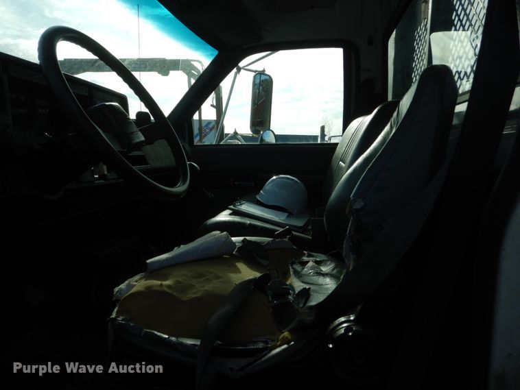 image for item HU9815 2002 GMC C7500  dump flatbed truck