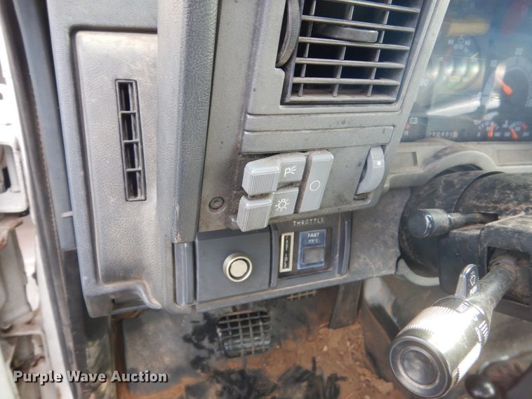 image for item HU9815 2002 GMC C7500  dump flatbed truck