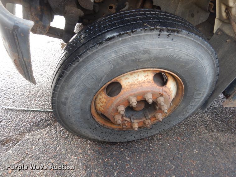 image for item HU9815 2002 GMC C7500  dump flatbed truck