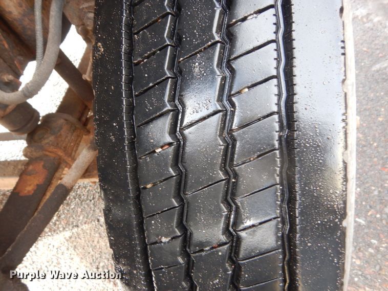 image for item HU9815 2002 GMC C7500  dump flatbed truck