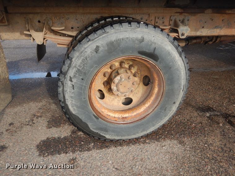 image for item HU9815 2002 GMC C7500  dump flatbed truck