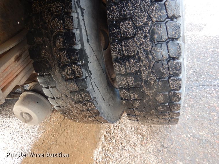 image for item HU9815 2002 GMC C7500  dump flatbed truck