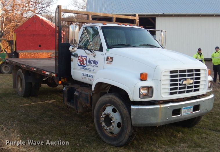 image for item HU9819 2002 Chevrolet C6500  dump flatbed truck