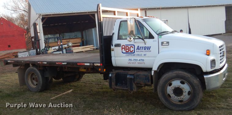 image for item HU9819 2002 Chevrolet C6500  dump flatbed truck