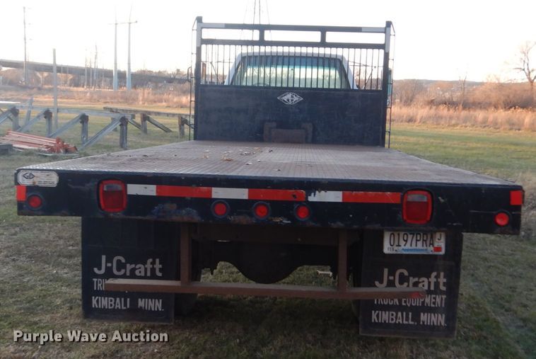 image for item HU9819 2002 Chevrolet C6500  dump flatbed truck