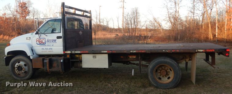 image for item HU9819 2002 Chevrolet C6500  dump flatbed truck