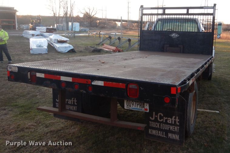 image for item HU9819 2002 Chevrolet C6500  dump flatbed truck