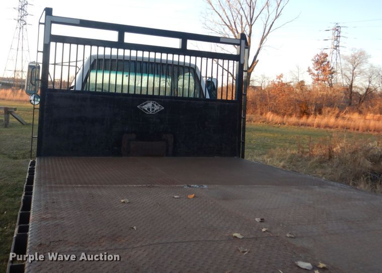 image for item HU9819 2002 Chevrolet C6500  dump flatbed truck