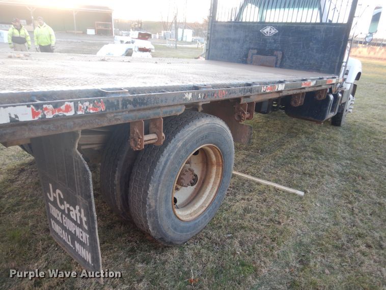 image for item HU9819 2002 Chevrolet C6500  dump flatbed truck