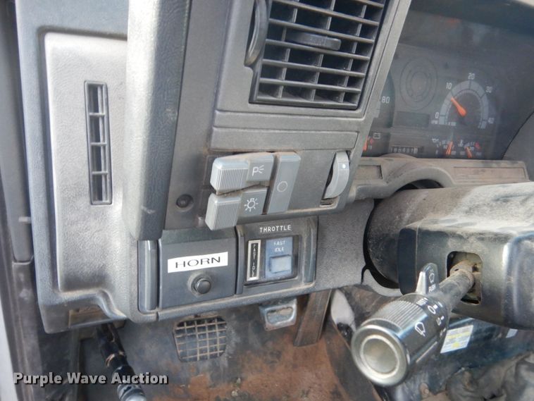 image for item HU9819 2002 Chevrolet C6500  dump flatbed truck