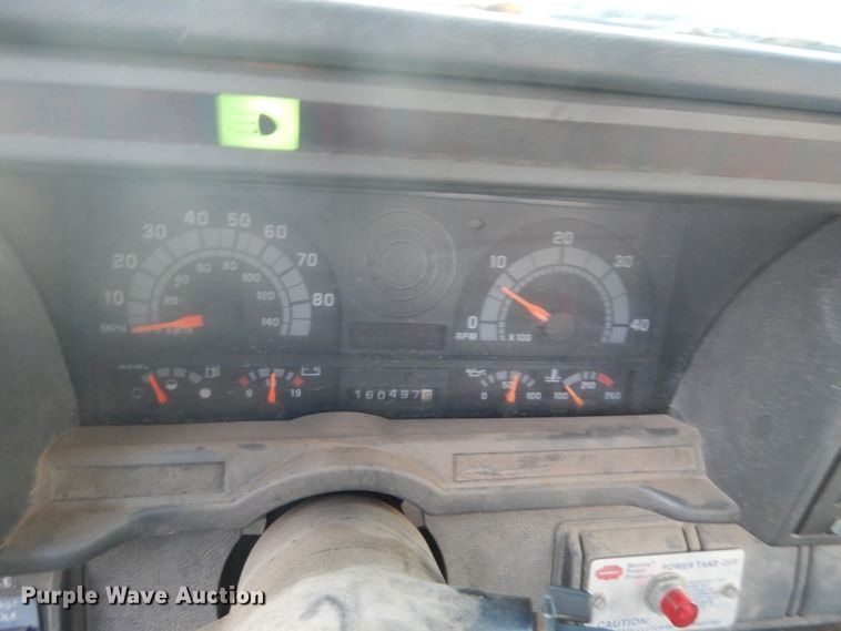 image for item HU9819 2002 Chevrolet C6500  dump flatbed truck