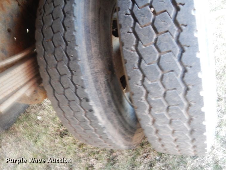 image for item HU9819 2002 Chevrolet C6500  dump flatbed truck