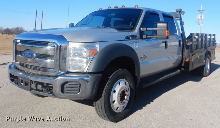image for item AE9502 2014 Ford F550 Super Duty XLT  Crew Cab flatbed truck