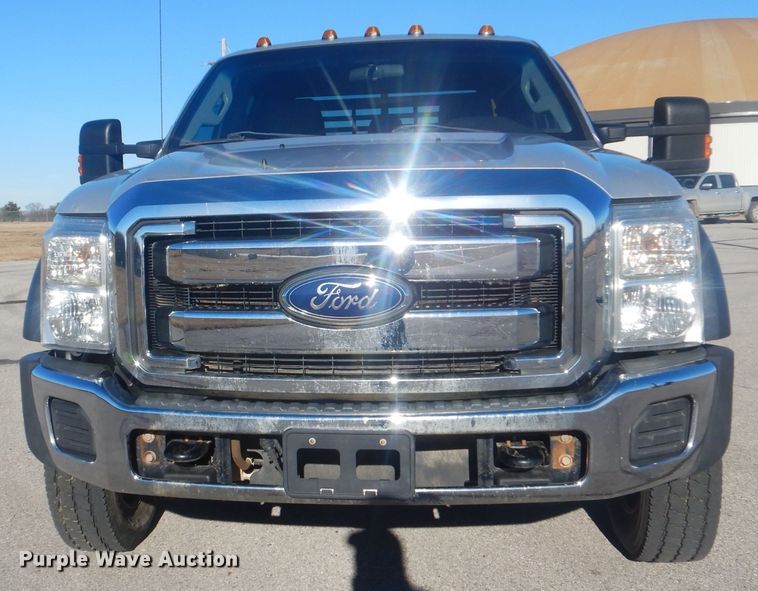 image for item AE9502 2014 Ford F550 Super Duty XLT  Crew Cab flatbed truck