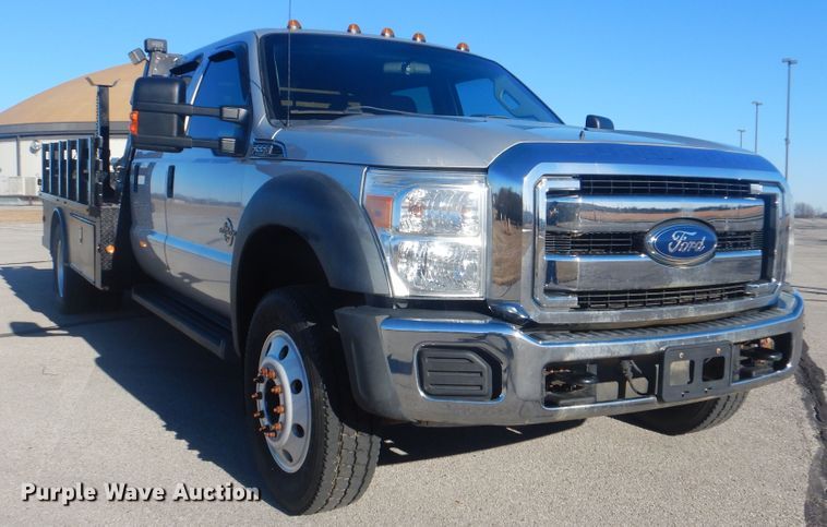 image for item AE9502 2014 Ford F550 Super Duty XLT  Crew Cab flatbed truck