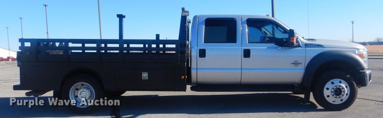image for item AE9502 2014 Ford F550 Super Duty XLT  Crew Cab flatbed truck