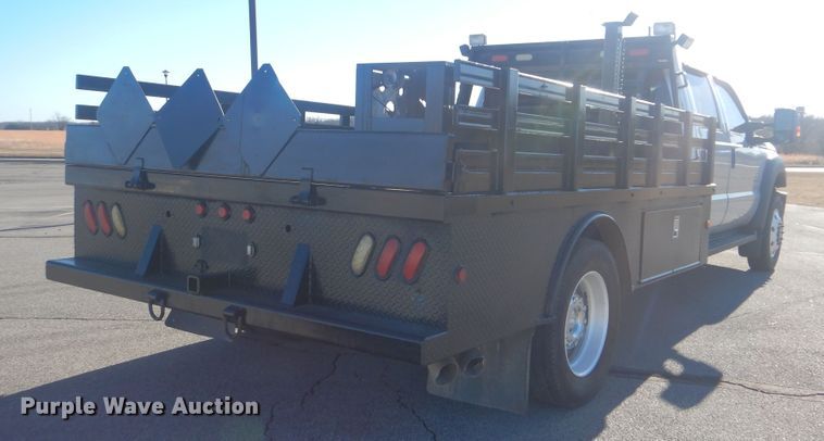 image for item AE9502 2014 Ford F550 Super Duty XLT  Crew Cab flatbed truck