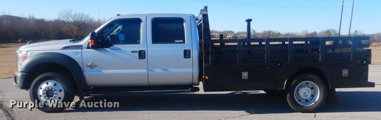 image for item AE9502 2014 Ford F550 Super Duty XLT  Crew Cab flatbed truck